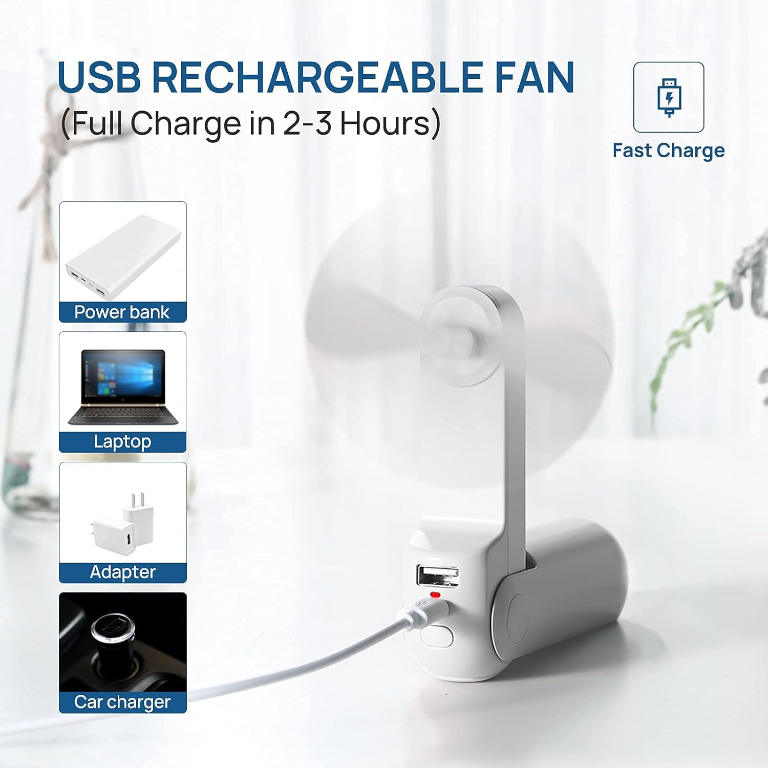 Ein kleiner weißer USB-Ventilator mit sich drehenden Rotorblättern, aufgeladen über USB.