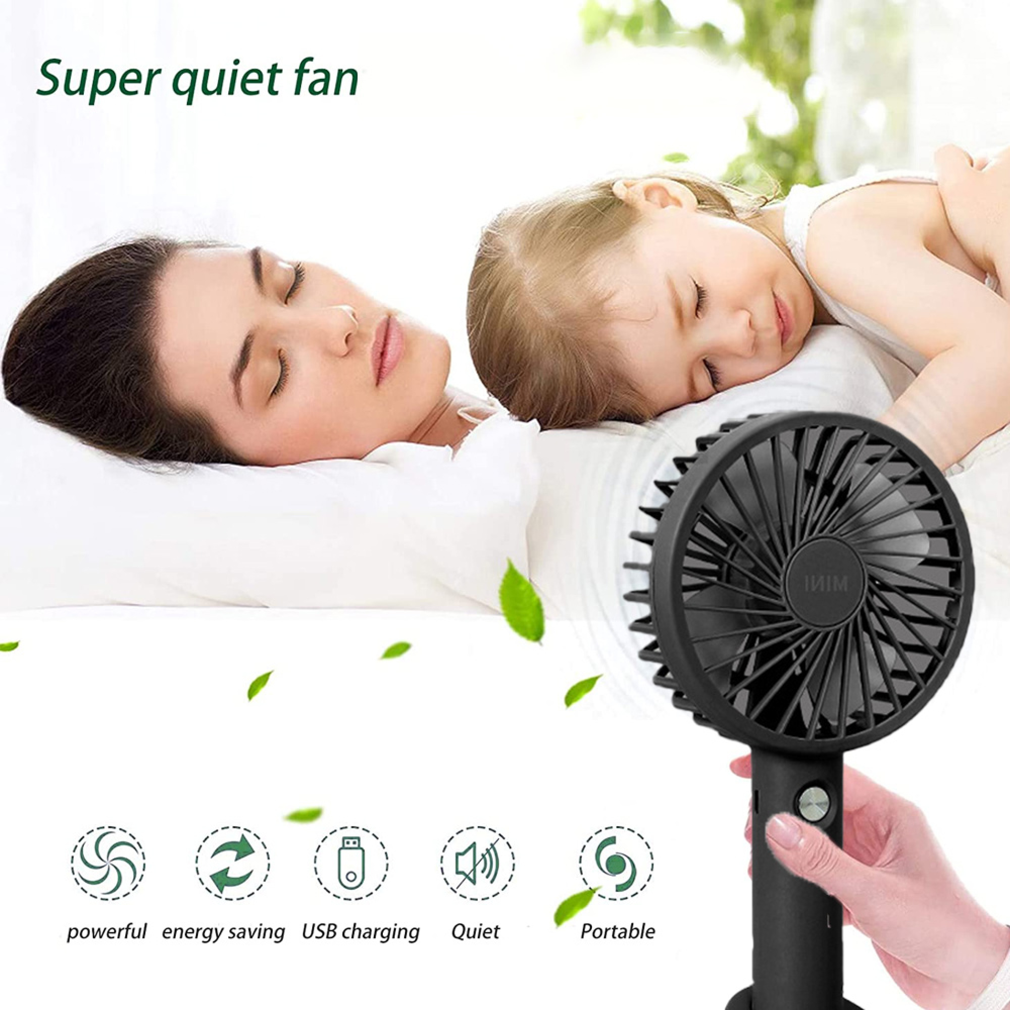 Ein schwarzer Mini-Ventilator mit Hand wird neben einer Frau und einem Kind gezeigt, die schlafen.
