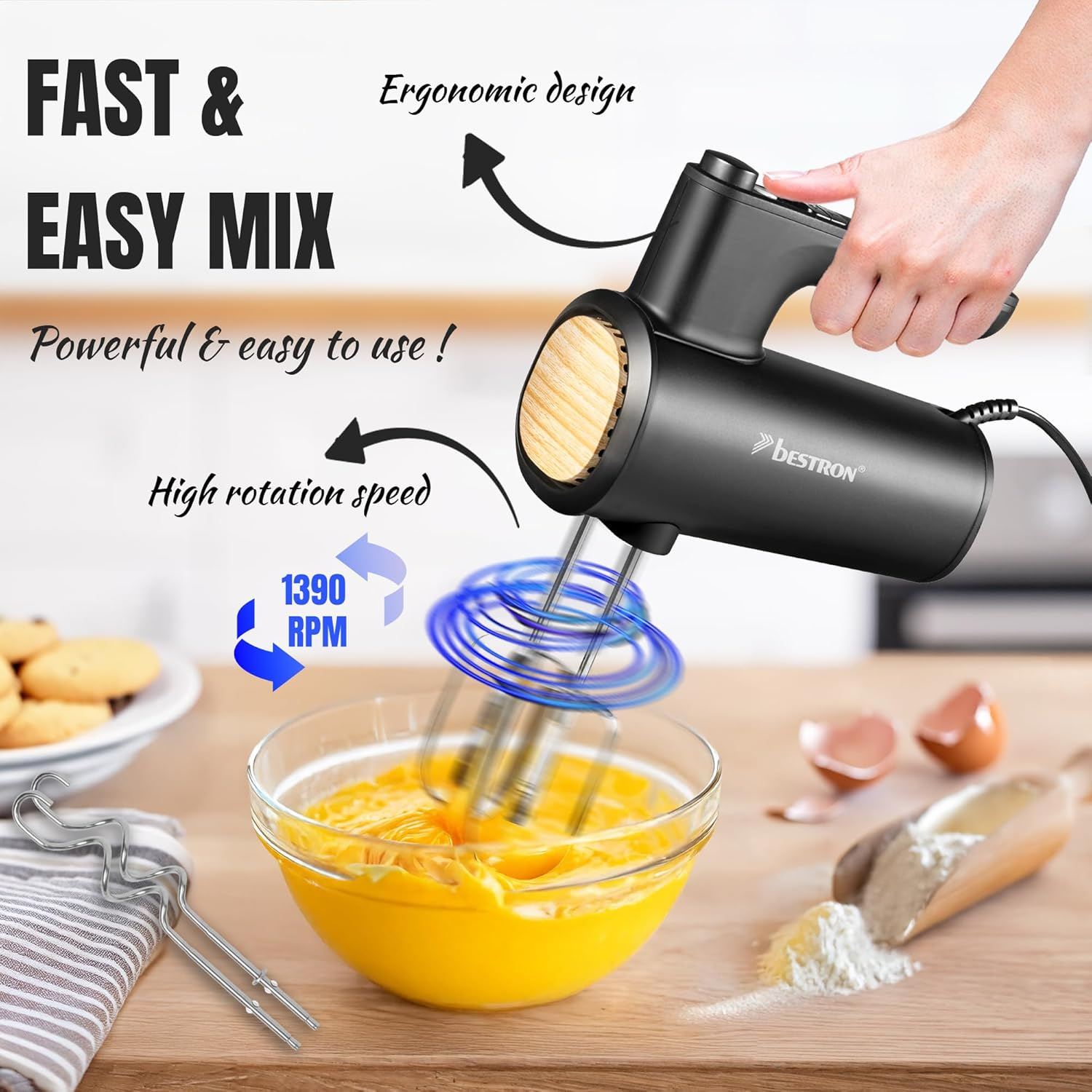 Ein Handmixer mit ergonomischem Design mixt Eigelb in einer Schüssel bei 1390 U/min.