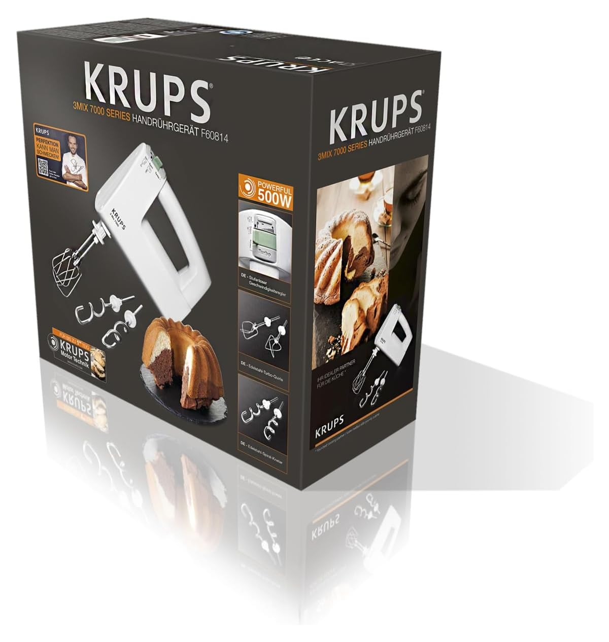 Krups Handrührgerät mit Kuchen und Zubehör auf der Verpackung.