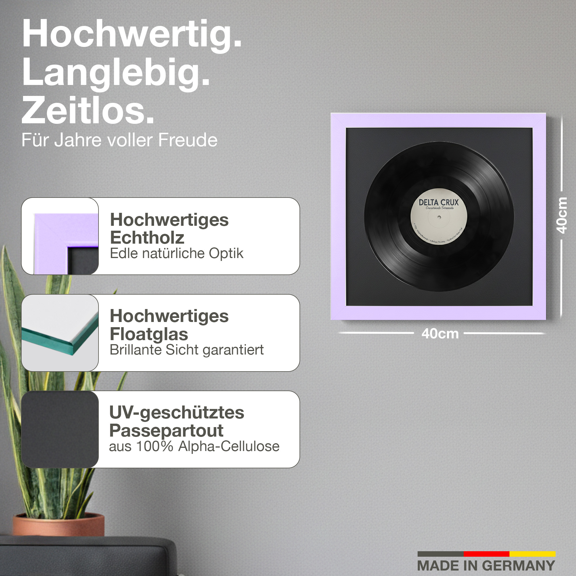Ein gerahmtes Vinyl mit Text auf Deutsch, 40x40cm.