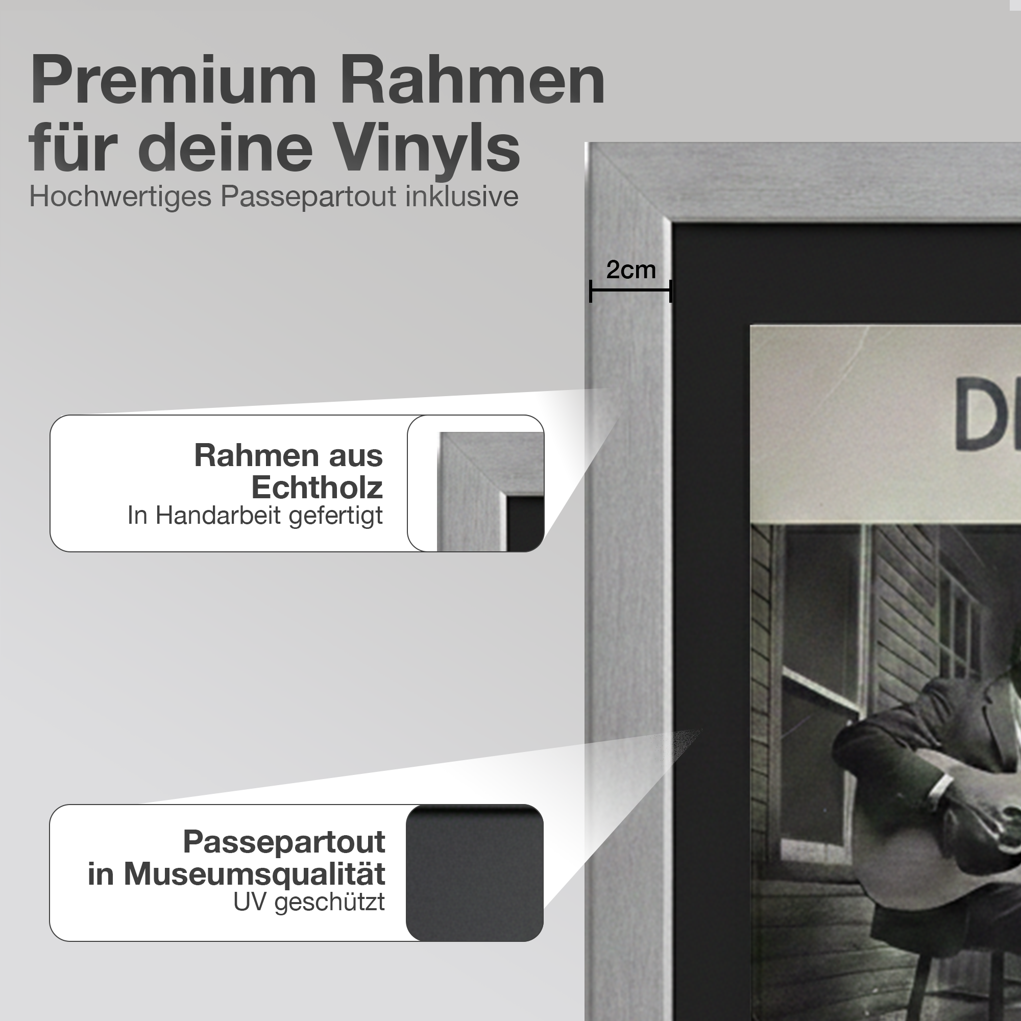 Grauer Rahmen mit Passepartout und einem Bild von einem Mann mit Gitarre.