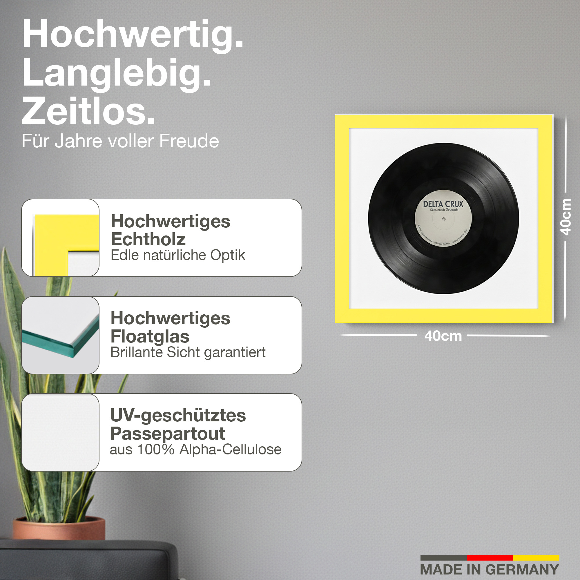 Ein 40cm gelb gerahmtes Bild mit einer schwarzen Schallplatte und Text.