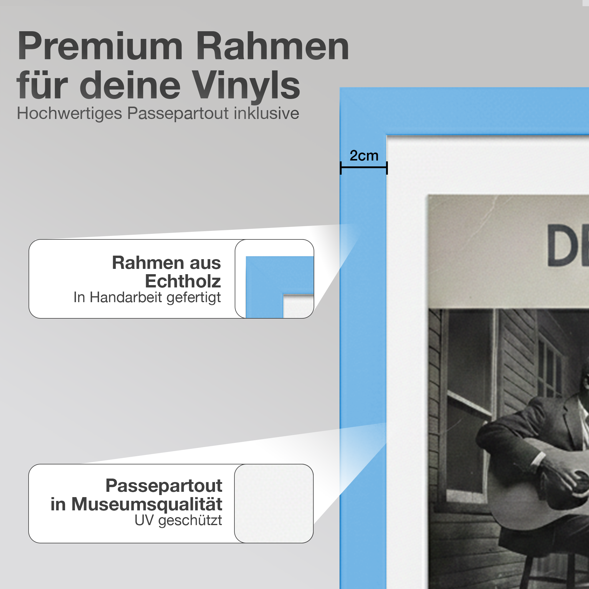Blauer Rahmen mit Bild eines Mannes, der Gitarre spielt. "Premium Rahmen", "Echtholz".