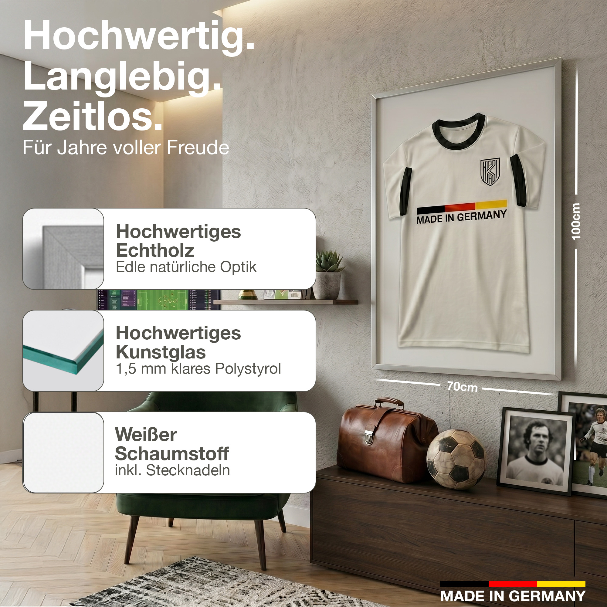 Gerahmtes deutsches Fußballtrikot mit "Made in Germany". daneben Tasche, Ball, Fotos.