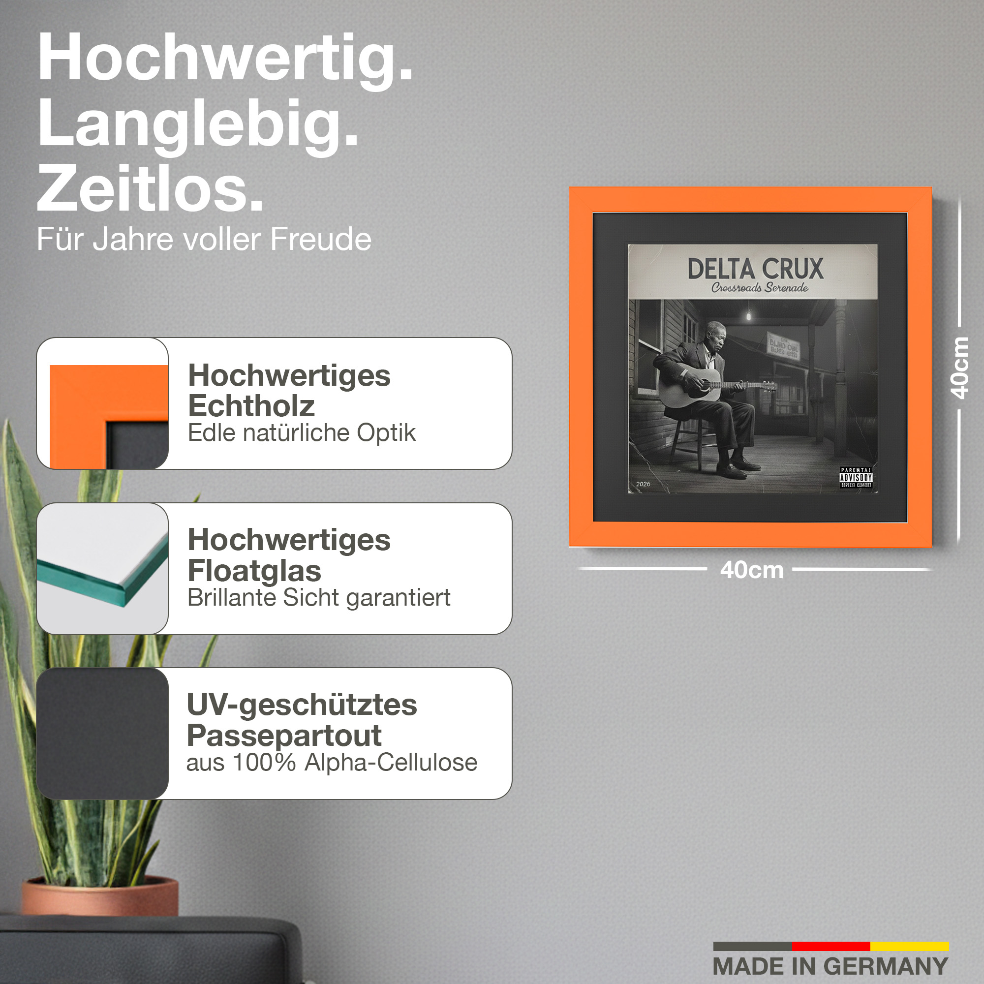 Orange gerahmtes Bild einer Schallplattenhülle mit einem Mann, der Gitarre spielt.
