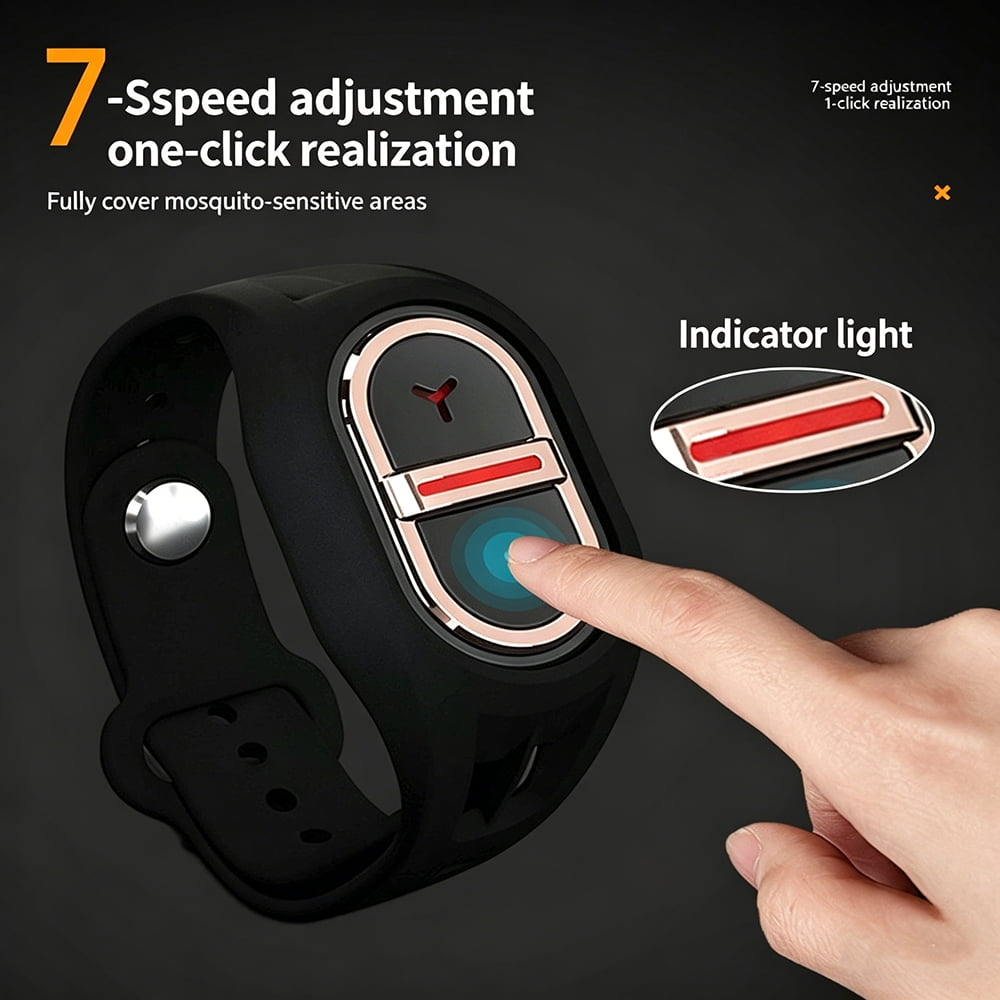 Eine Hand drückt auf ein schwarzes Armbandgerät mit einem beleuchteten Bedienfeld.