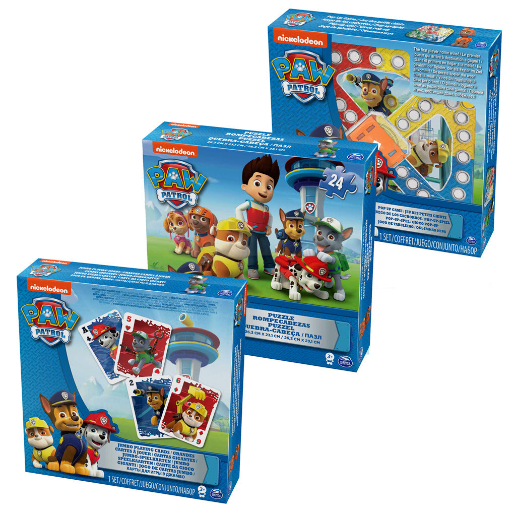 Drei Paw Patrol Spielzeugverpackungen: Karten, ein Brettspiel und ein Puzzle.