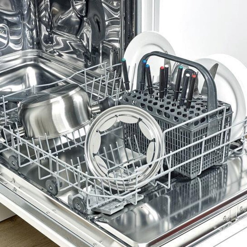 Inside an open dishwasher: stainless steel pot, lid, plates, and cutlery basket.