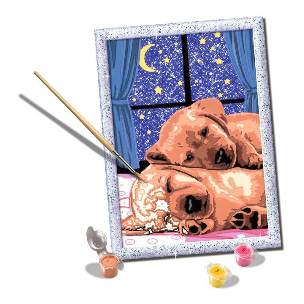 Dos cachorros duermen bajo un cielo estrellado con luna. Un kit de pintura.