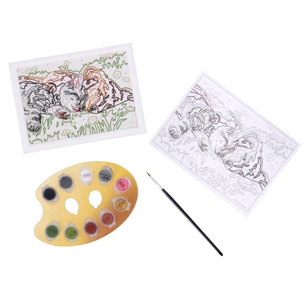 Ein Malset mit Farbpalette, Pinsel und Vorlagen zweier schlafender Hunde.