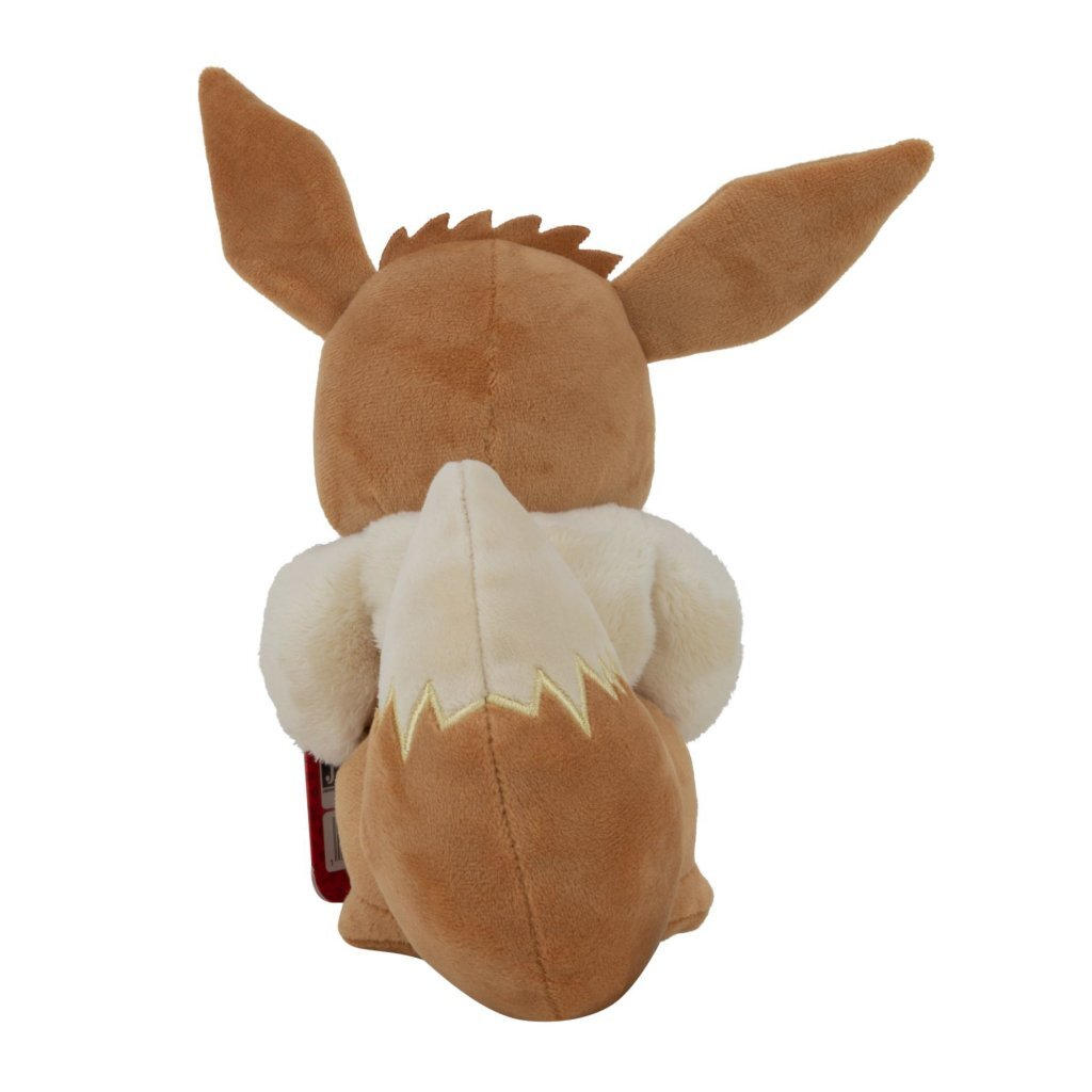 Ein brauner Eevee-Plüsch mit weißem Kragen und buschigem Schwanz.