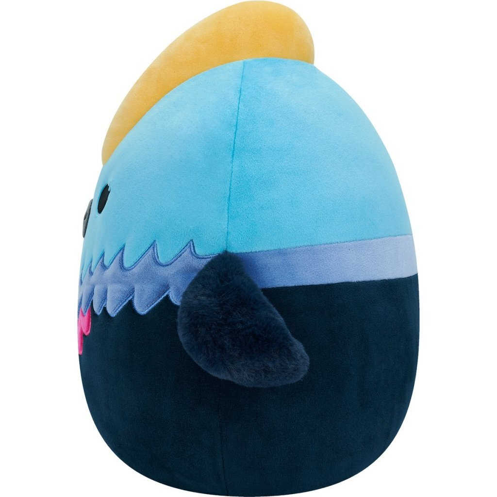 Une peluche bleue en forme d'œuf, chapeau jaune, corps sombre.