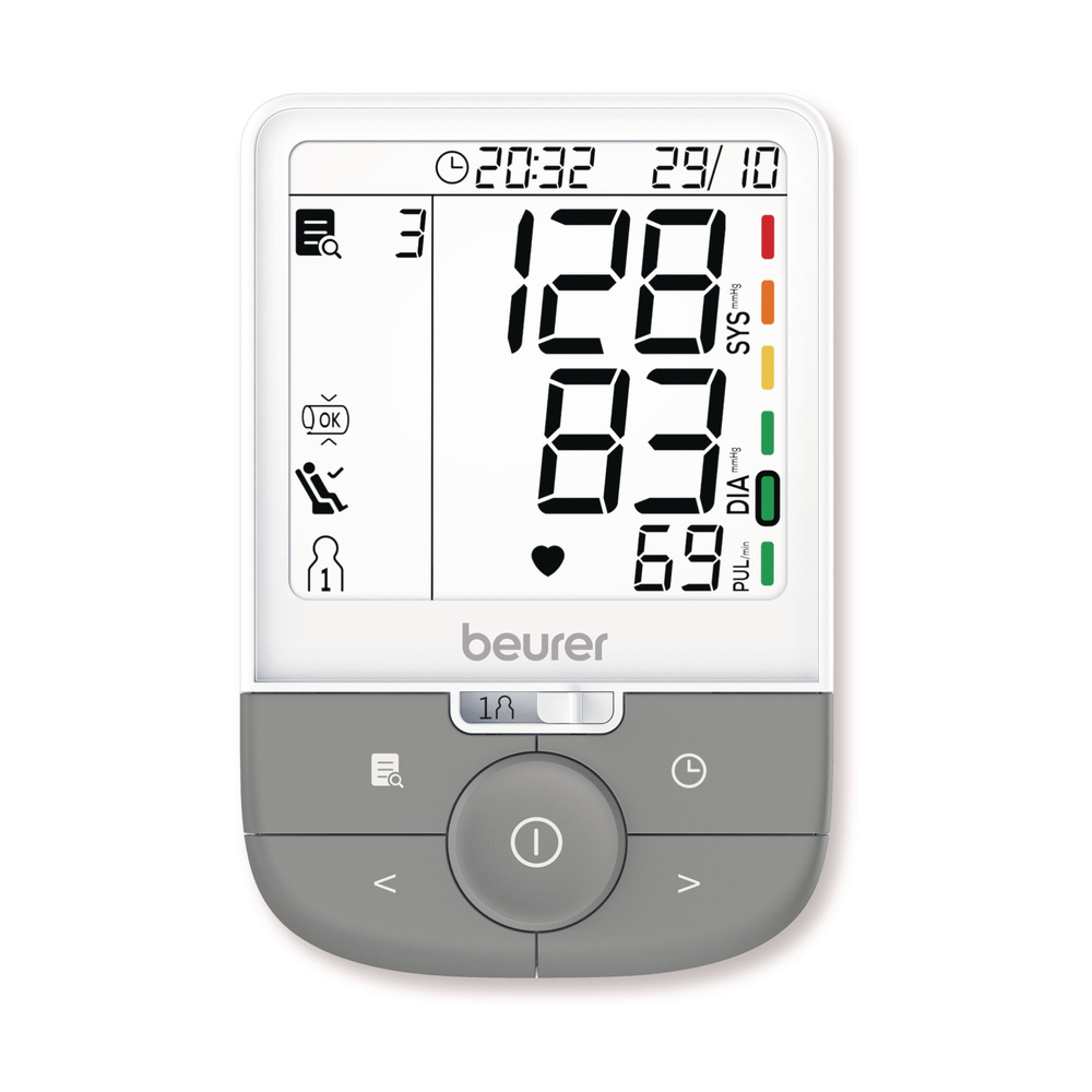 Moniteur numérique de tension artérielle au bras avec écran clair affichant 128/83 mmHg et 69 bpm.