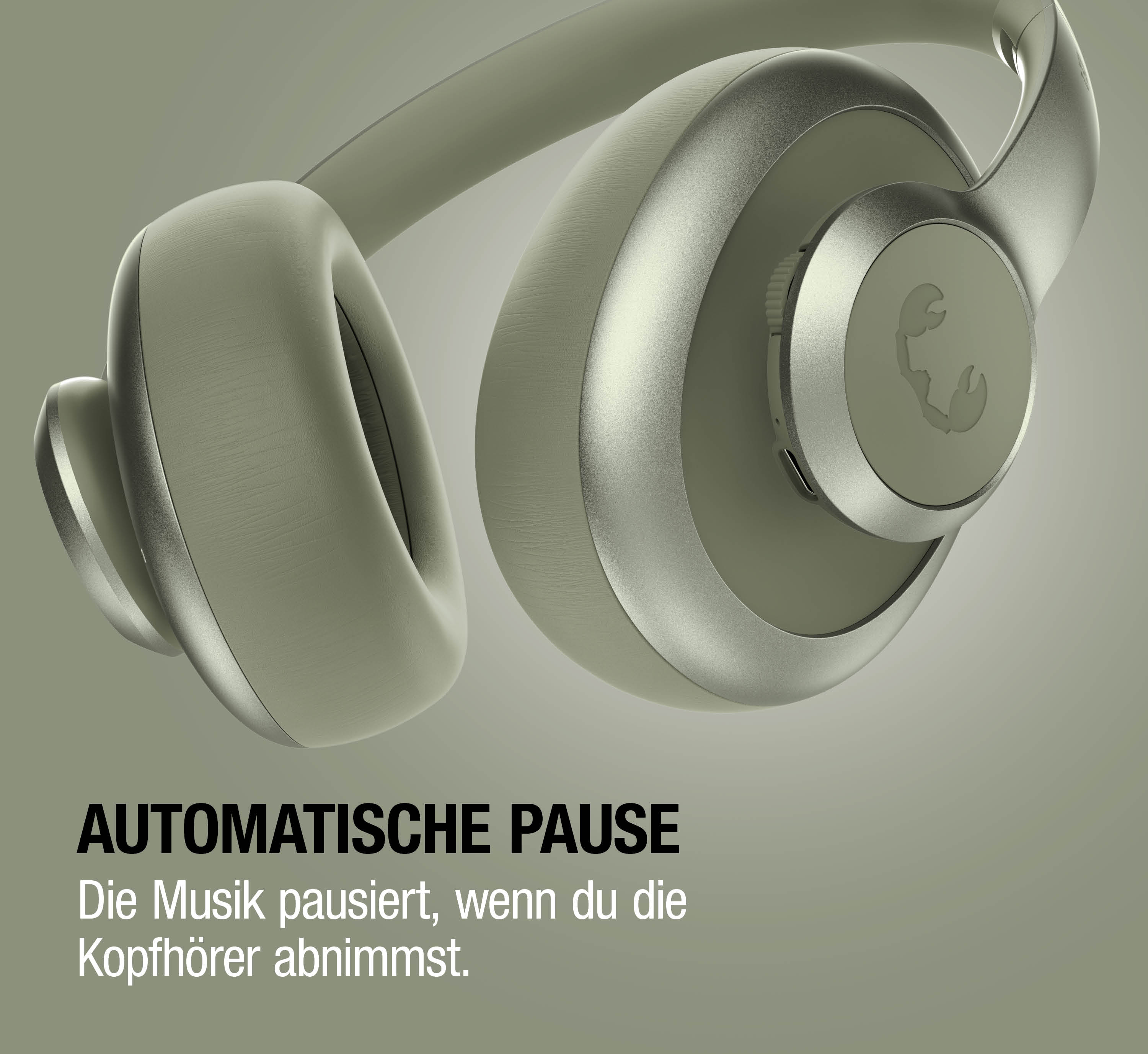 Graue Kopfhörer mit AUTOMATISCHE PAUSE Schriftzug.