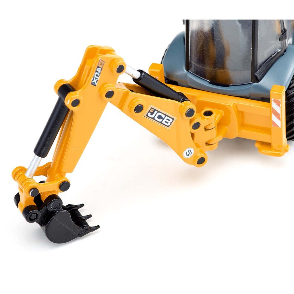 Ein gelber Baggerarm mit JCB-Logo und ein kleiner Löffel.