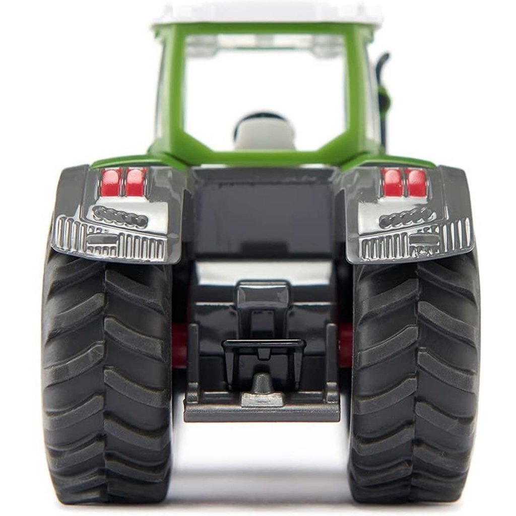 Grüner Traktor mit weißen und schwarzen Details, Heckansicht mit großen Reifen.