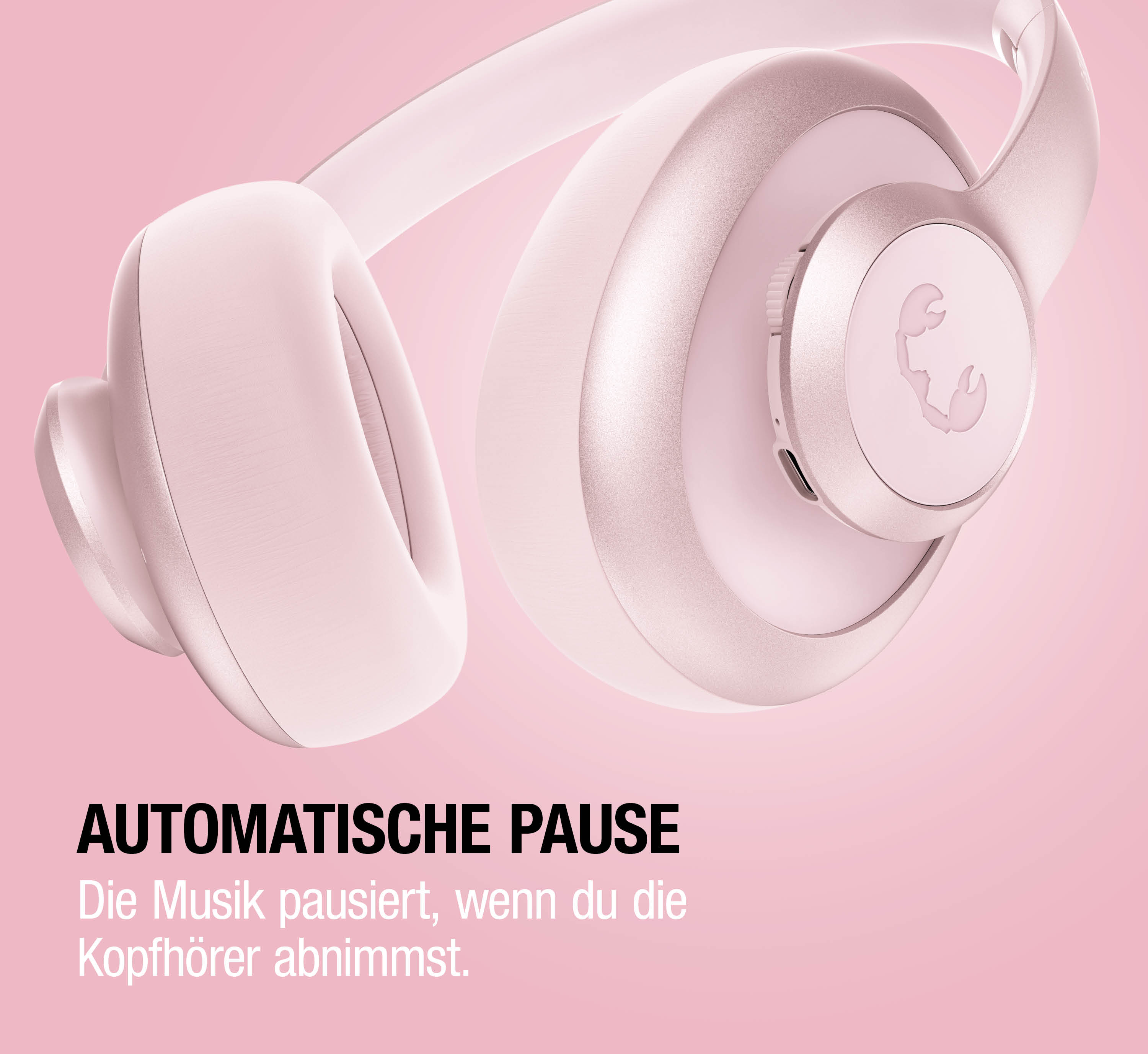 Ein rosafarbenes Headset mit einem Skorpion-Logo und Text.