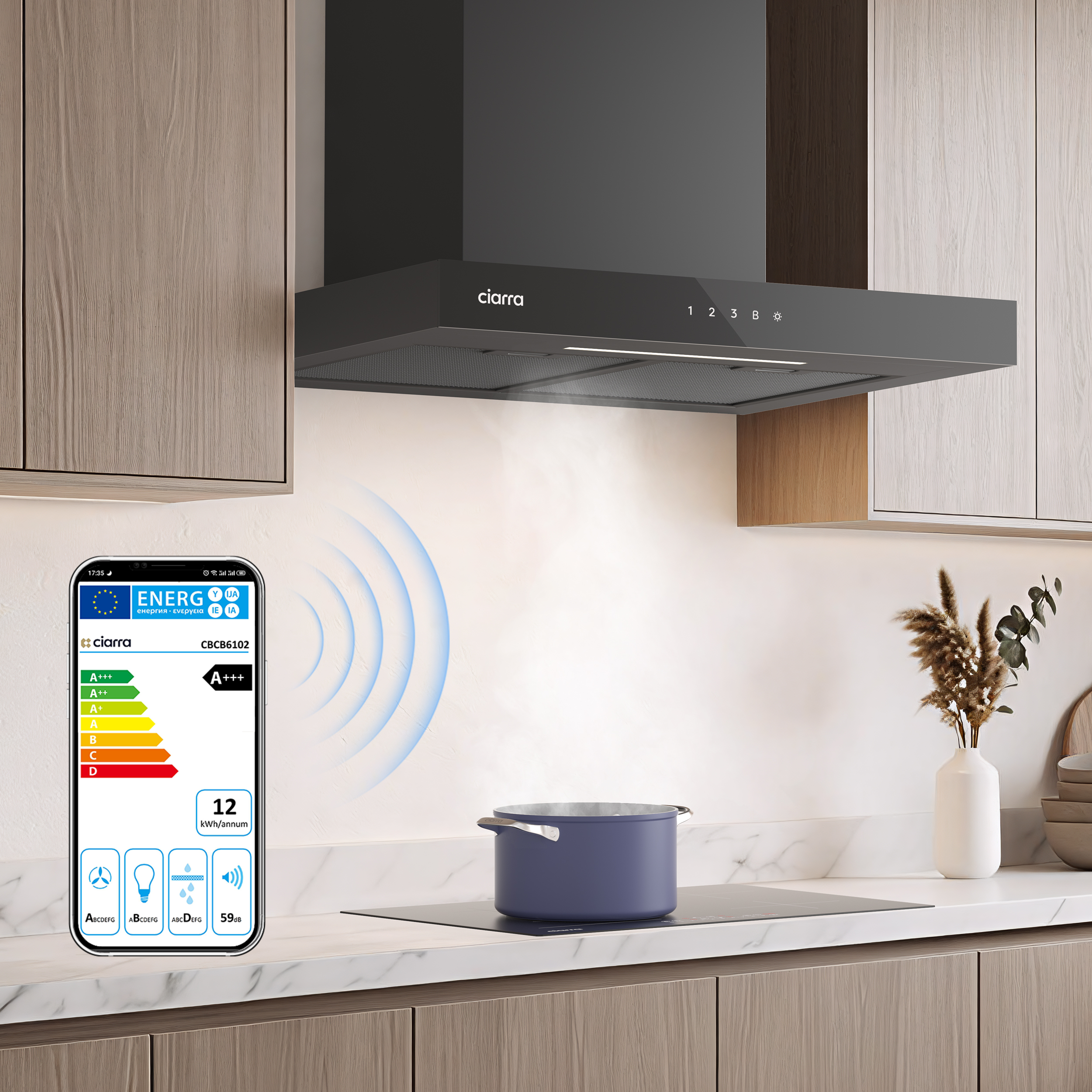 Moderne Küche mit Dunstabzugshaube, Induktionskochfeld und Topf, Handy mit Energieetikett.