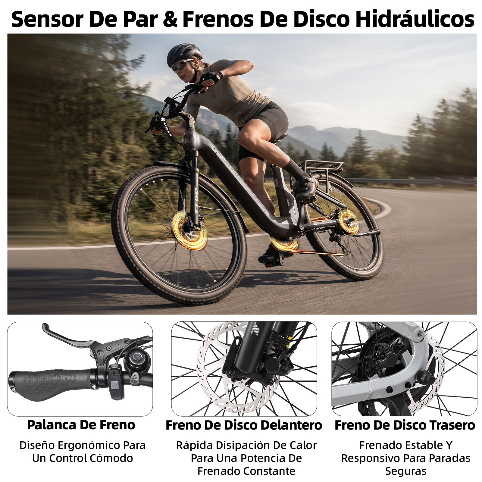 Una mujer monta una bicicleta eléctrica en una carretera con árboles y montañas.