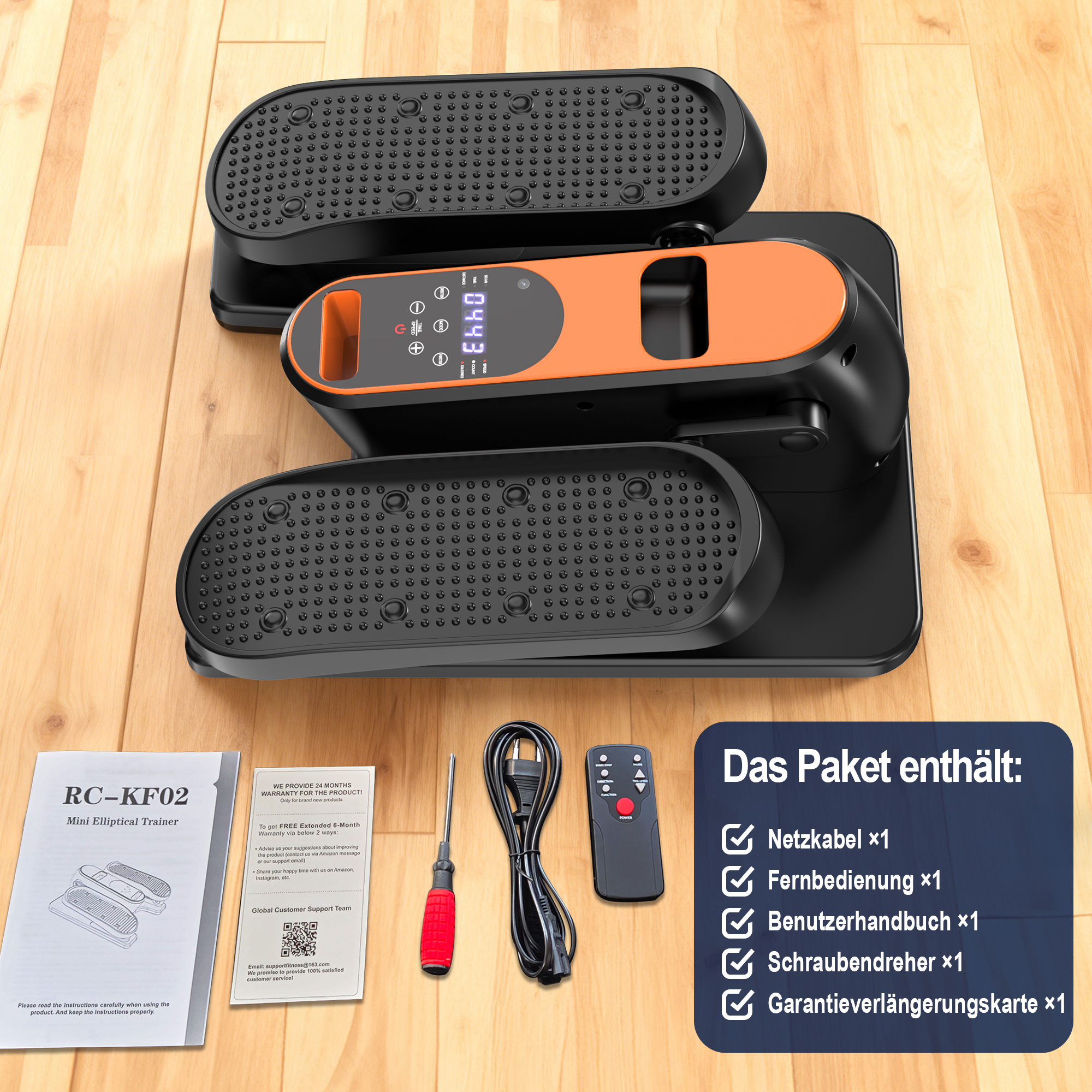 Ein schwarzer und oranger Mini-Ellipsentrainer mit Fernbedienung und Anleitung.
