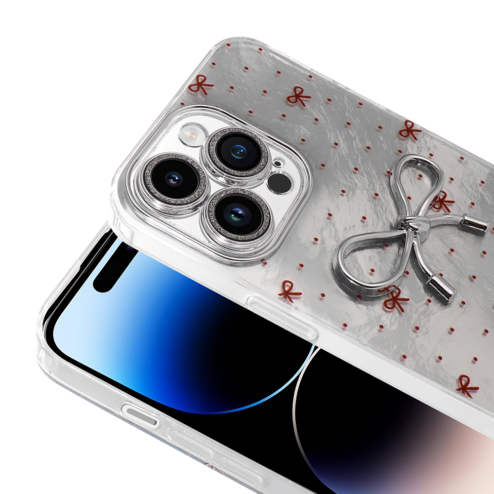 Gümüş simli, kırmızı fiyonklu ve gümüş fiyonk stantlı şeffaf iPhone kılıfı.