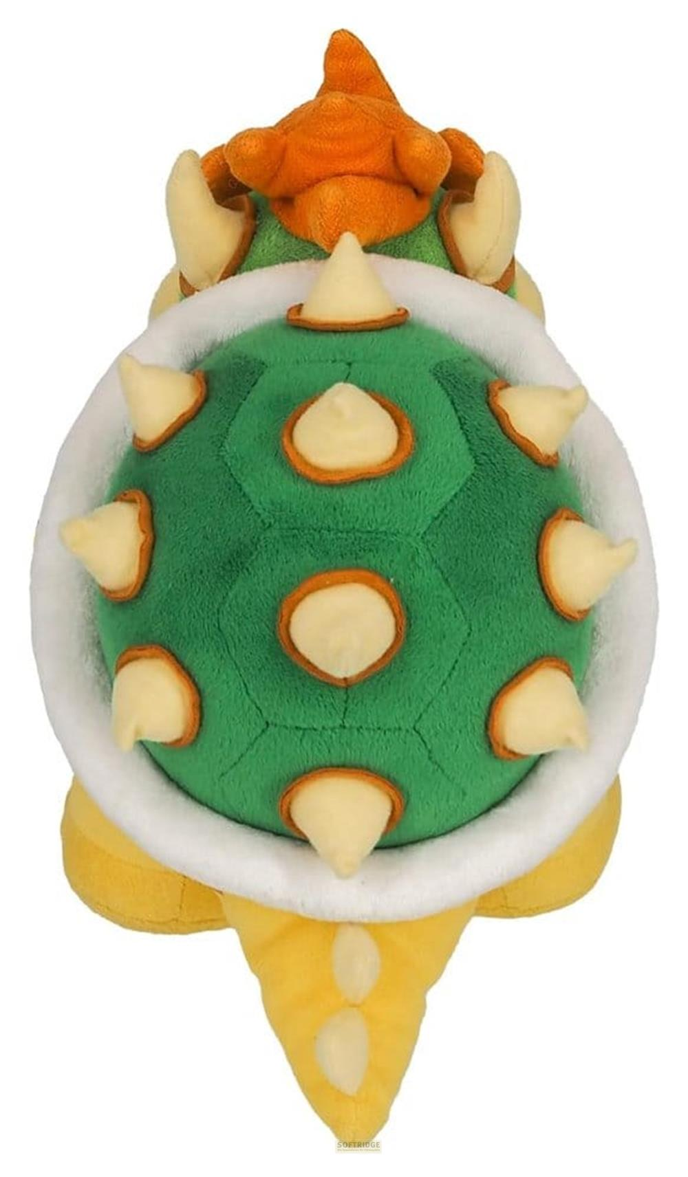 Ein Plüschtier von Bowser mit grüner Schale, weißen Stacheln und gelben Füßen.