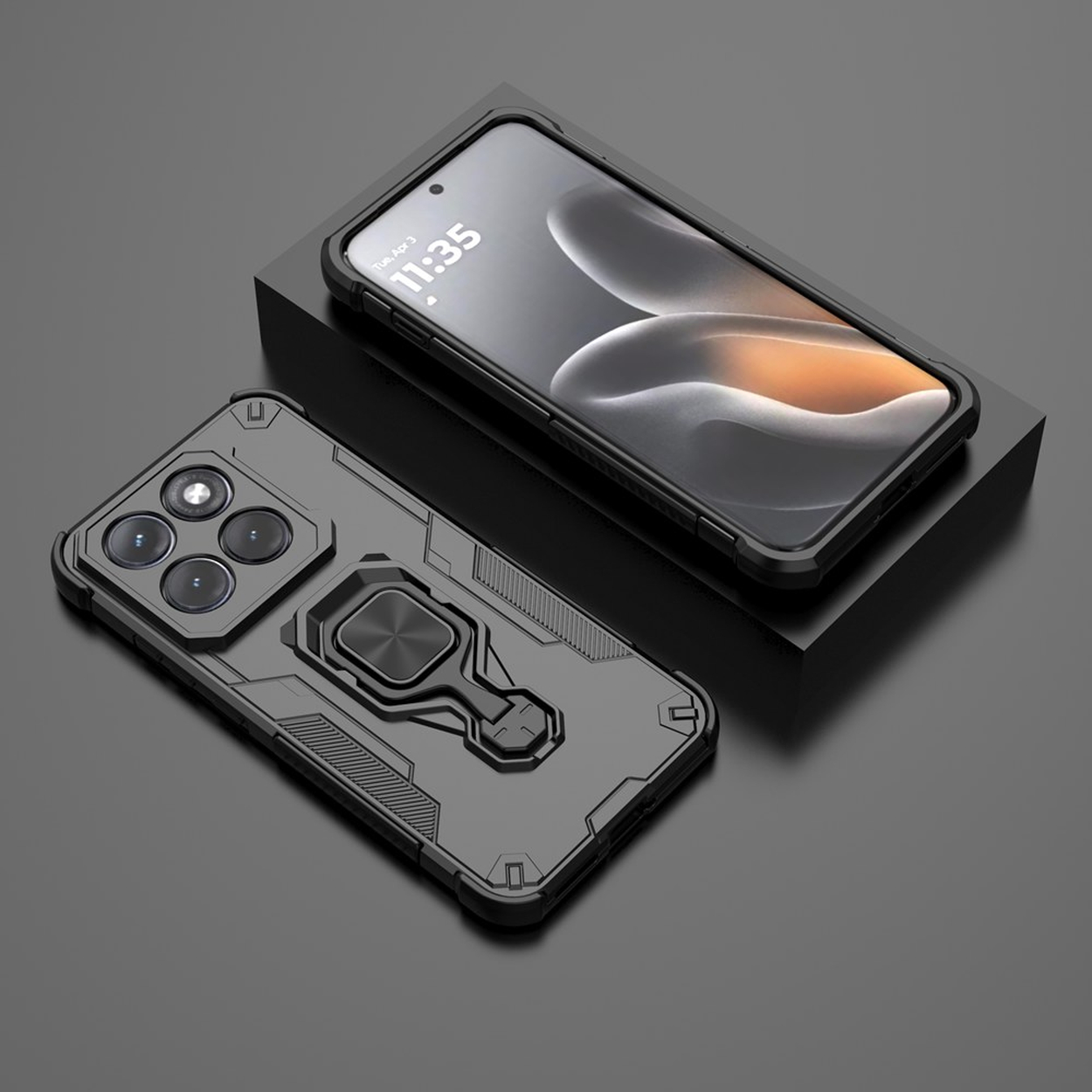 Zwarte smartphone met ringhouder en drievoudige camera achteraan.