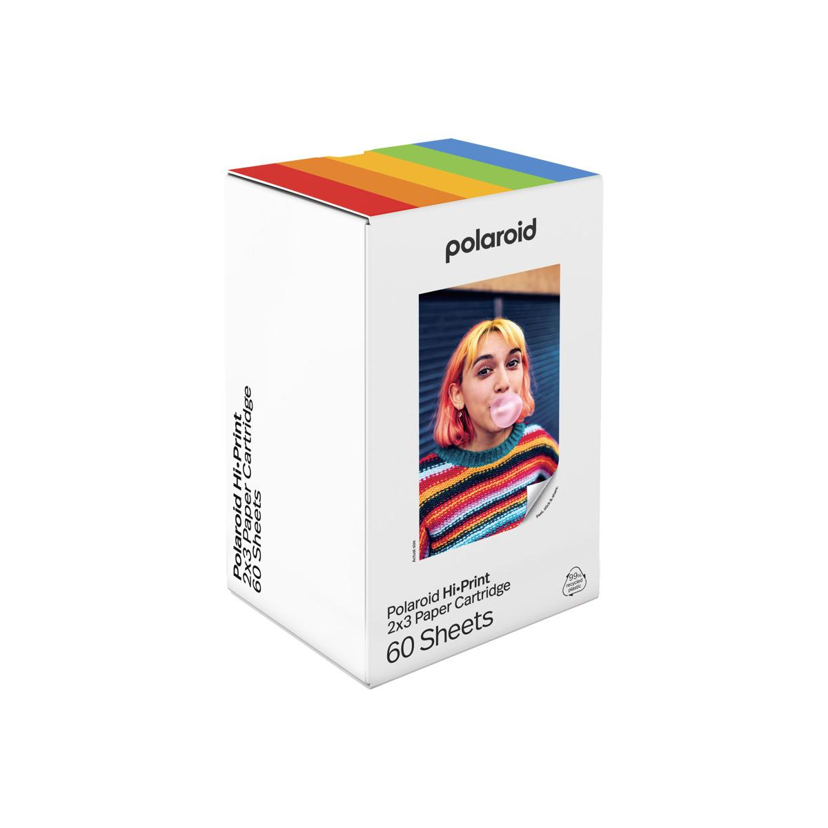 Polaroid Hi-Print 2x3 Papierkassette-Box mit Regenbogen-Oberseite und Bild einer blasenblasenden Person.