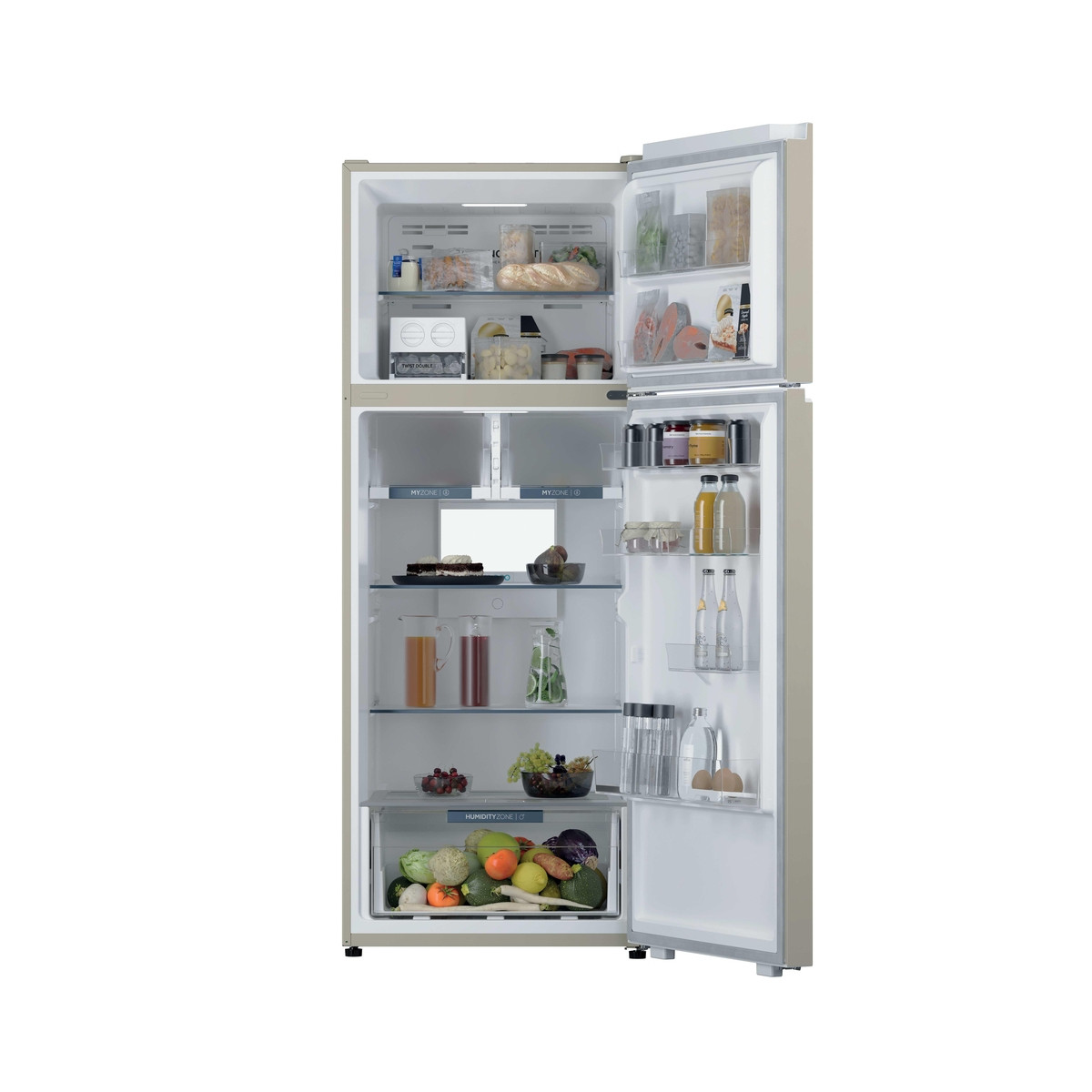 Un frigorifero beige aperto pieno di cibo e bevande.