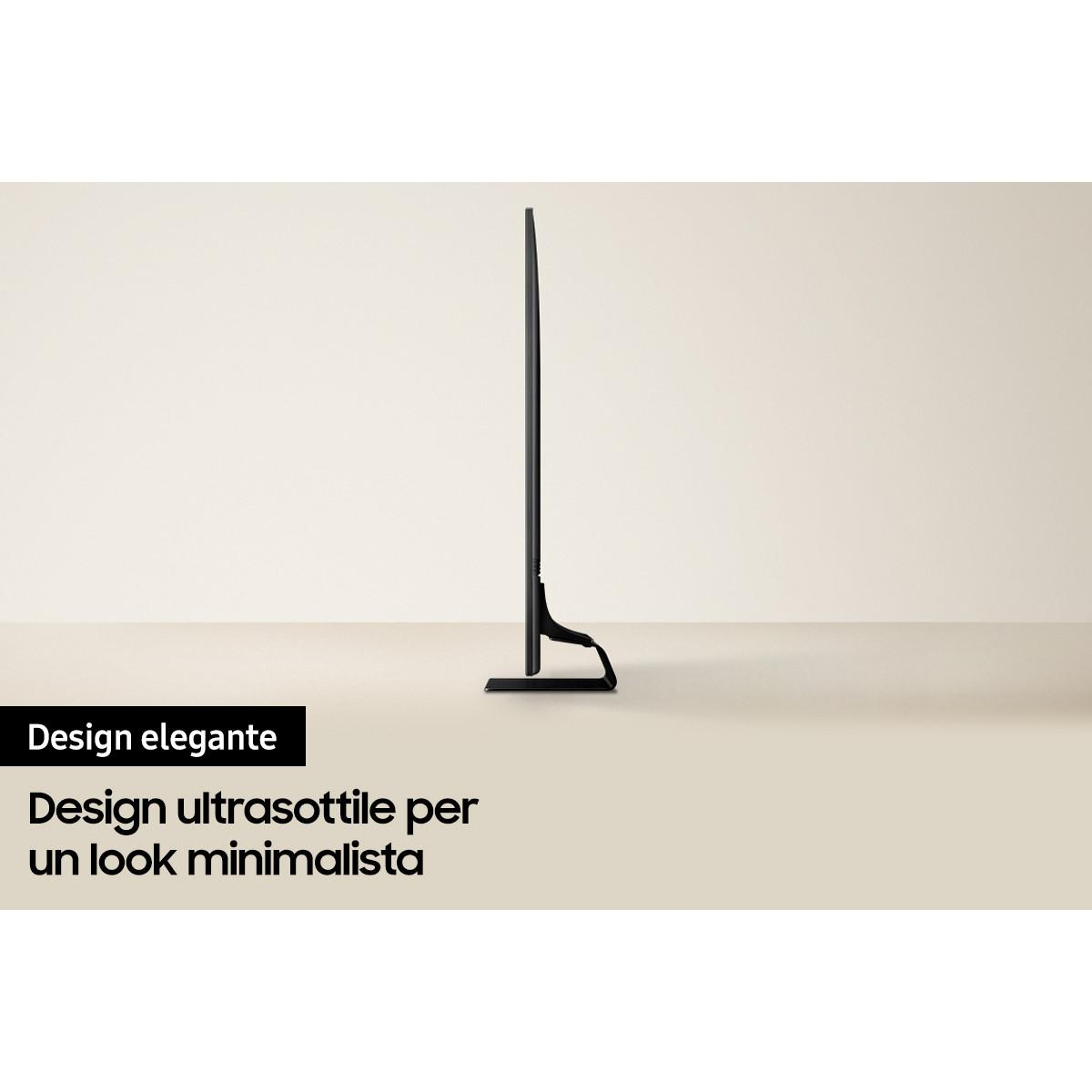 TV nero ultrasottile dal design minimalista su un piedistallo.