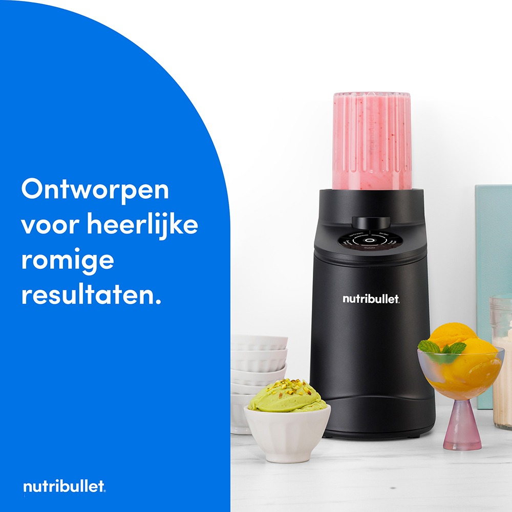 A black Nutribullet blender with a pink smoothie, next to bowls of ice cream.