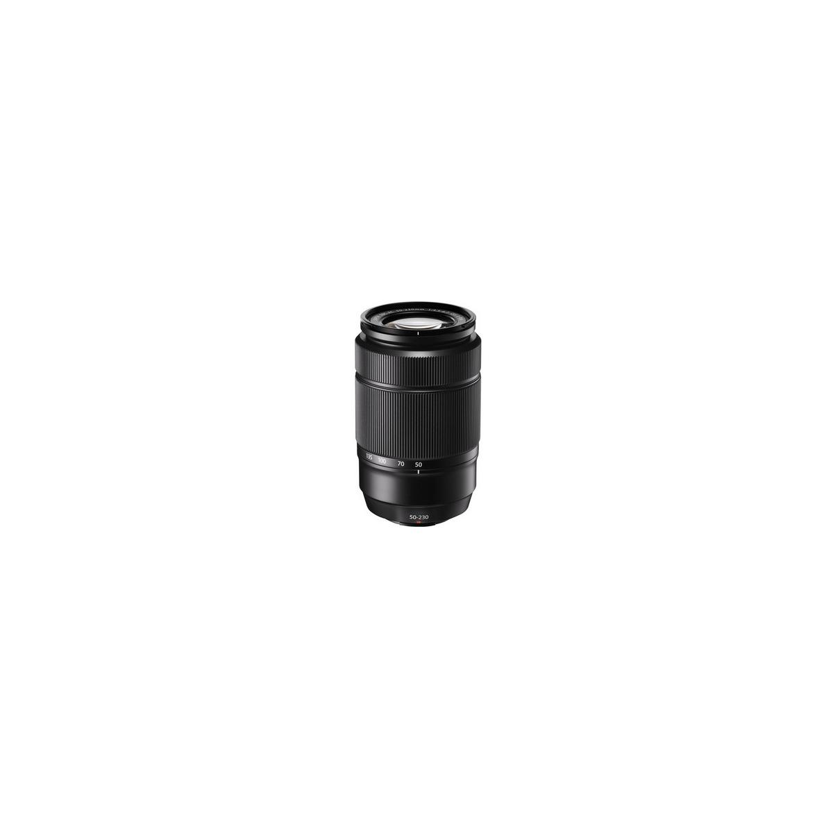 Un objetivo de cámara negro con anillo de zoom y escala de enfoque, sobre fondo blanco.