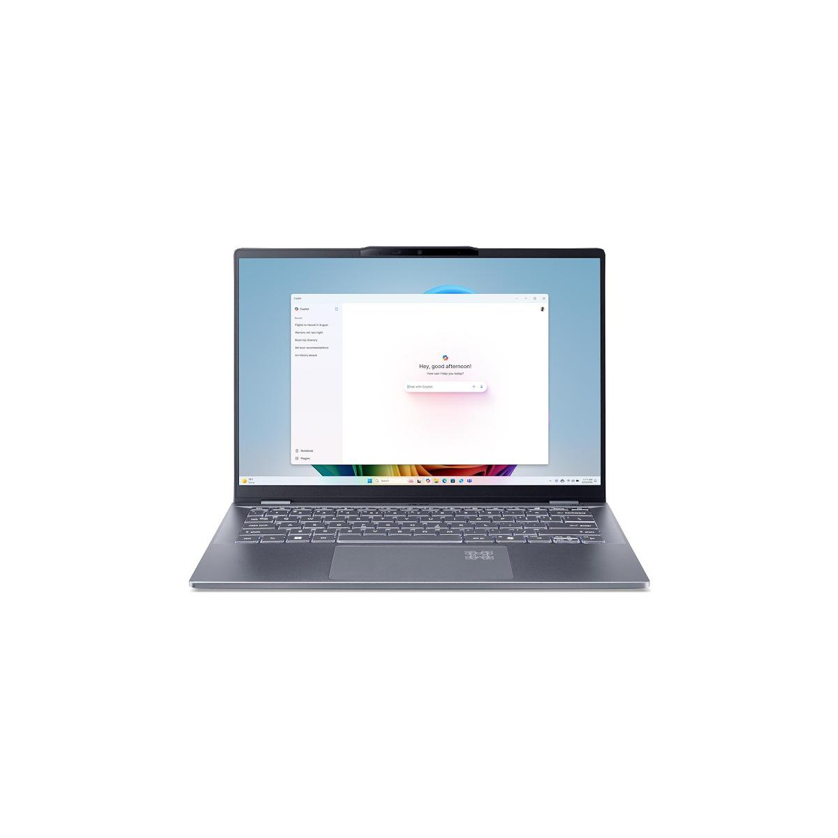 Un laptop aperto con una finestra di chat sullo schermo.
