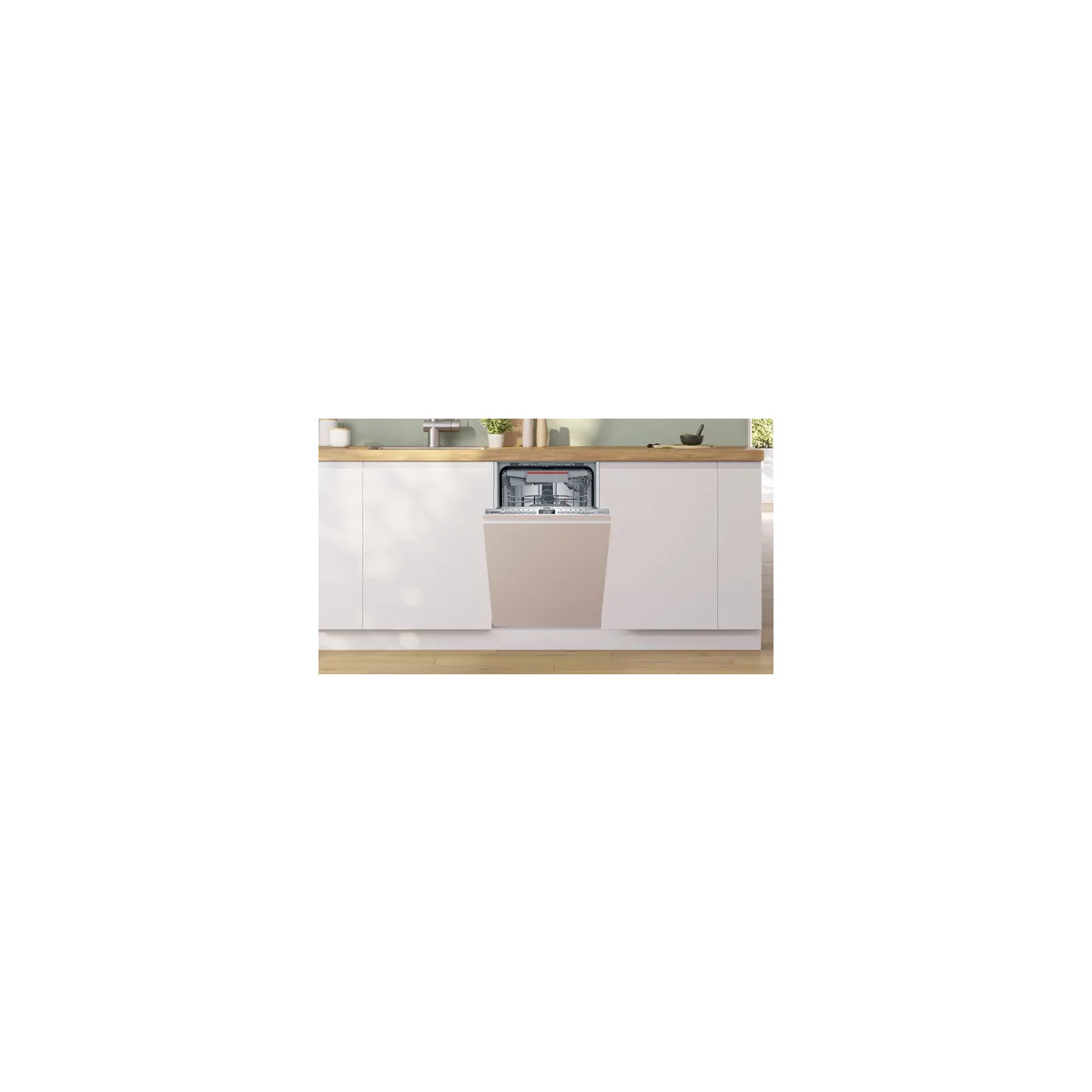 Un lavavajillas abierto está en una cocina moderna con gabinetes blancos y panel beige.