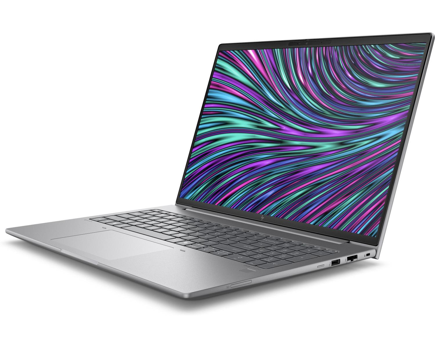 Un laptop argentato aperto con uno sfondo astratto e colorato sullo schermo.