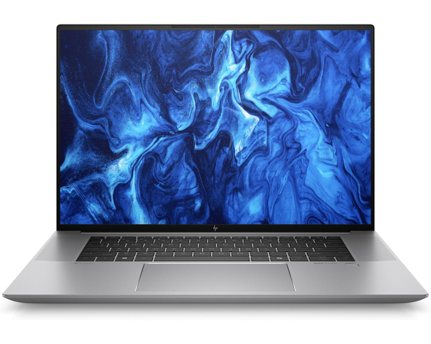 Un laptop argentato con uno sfondo blu vorticoso sullo schermo.