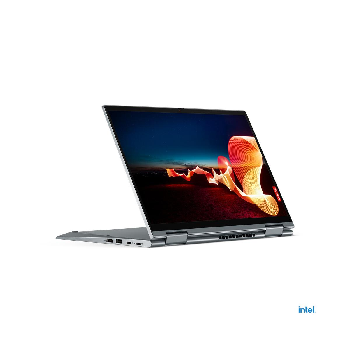 Un laptop aperto con un'opera d'arte luminosa astratta sullo schermo.