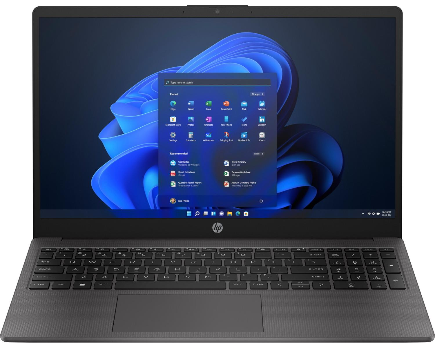 Un laptop aperto che mostra uno sfondo scuro con il menu Start di Windows.