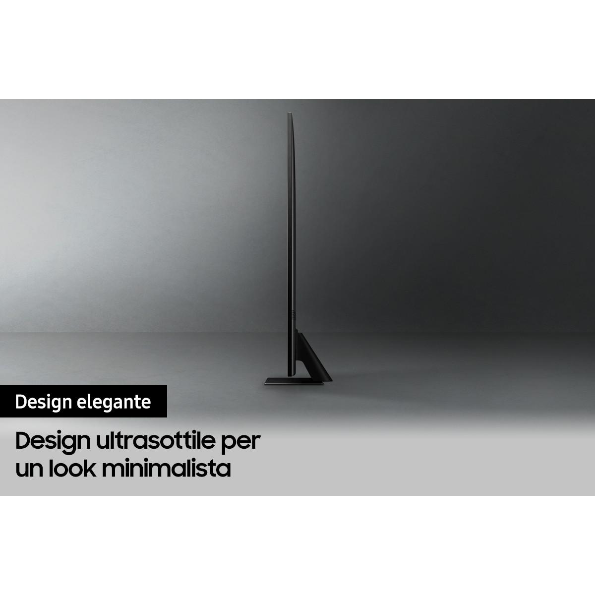 Una TV nera e sottile su una base, con uno sfondo scuro.
