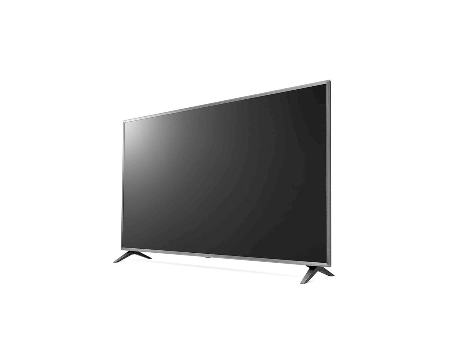 Un televisor moderno de pantalla plana con bisel plateado delgado y dos patas.