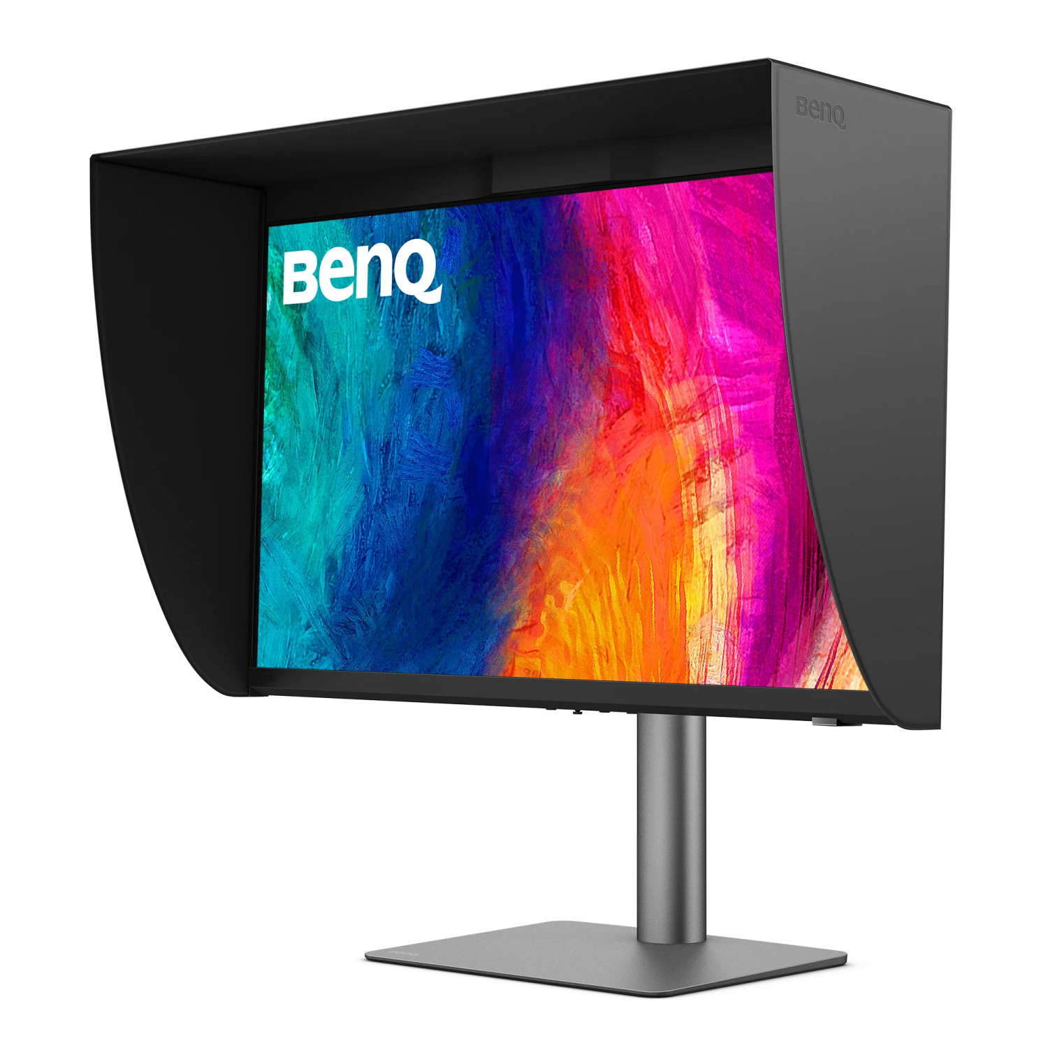 A BenQ monitor with a black hood displays a colorful abstract pattern on a white background.