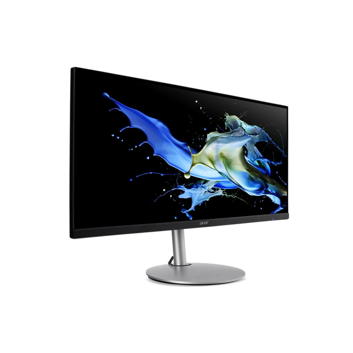 An Acer monitor displaying an abstract blue and green screensaver on a black background.