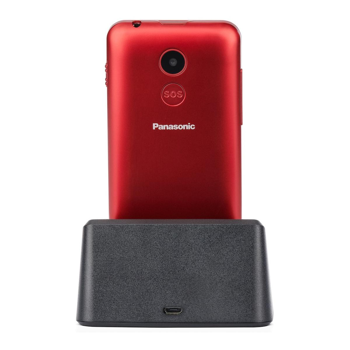 Rotes Panasonic-Telefon mit SOS-Taste auf schwarzer Ladebasis.