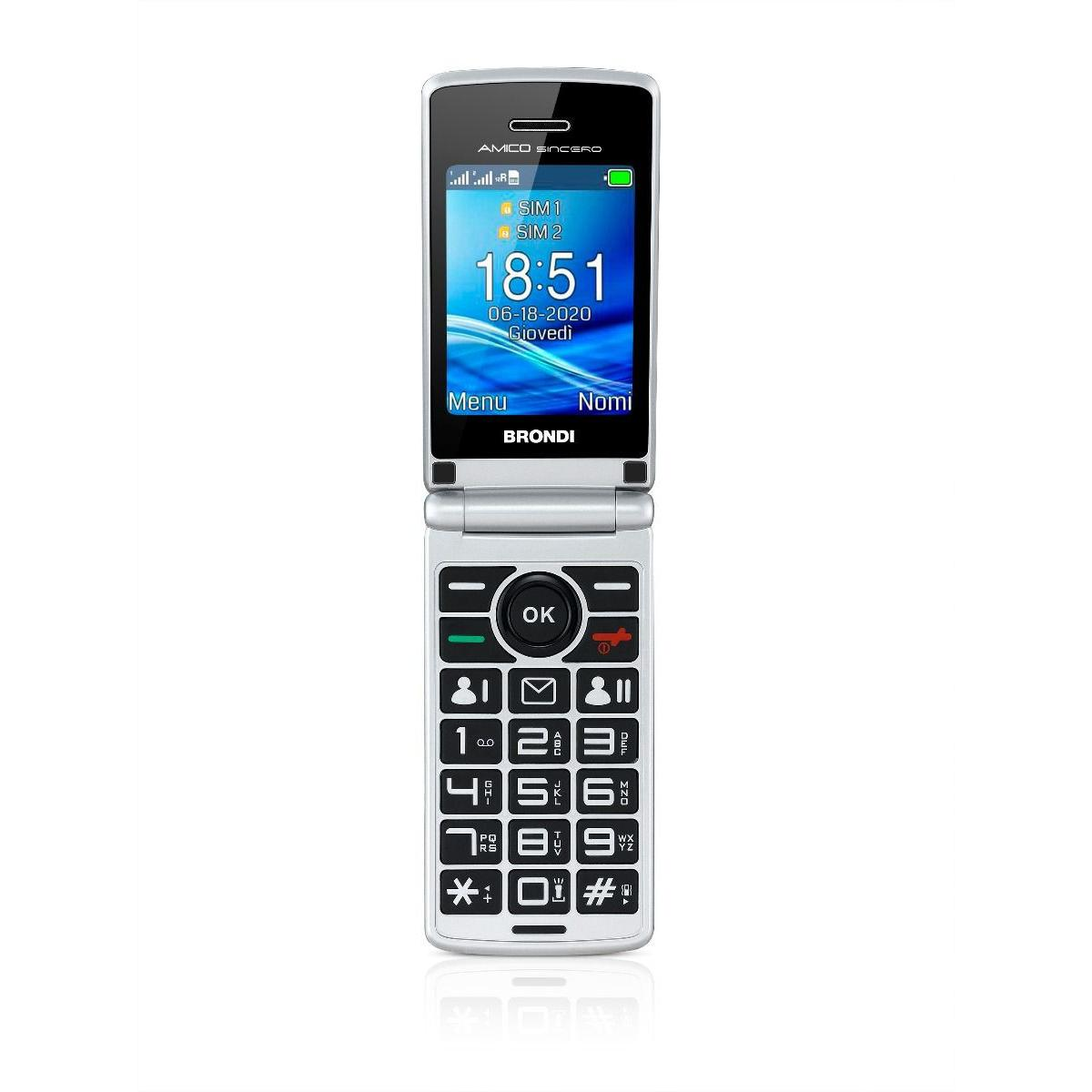 Un telefono a conchiglia Brondi aperto mostra l'ora 18:51, data, stato SIM e pulsanti.