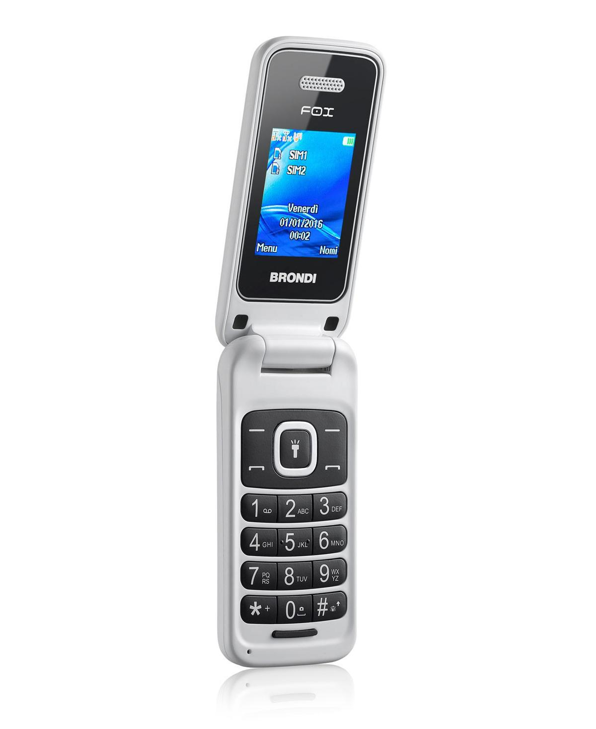 Un telefono a conchiglia bianco con tastiera e schermo che mostra data e ora.