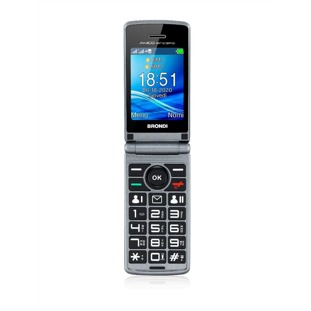 Un telefono a conchiglia grigio con tastiera grande e display che mostra l'ora.