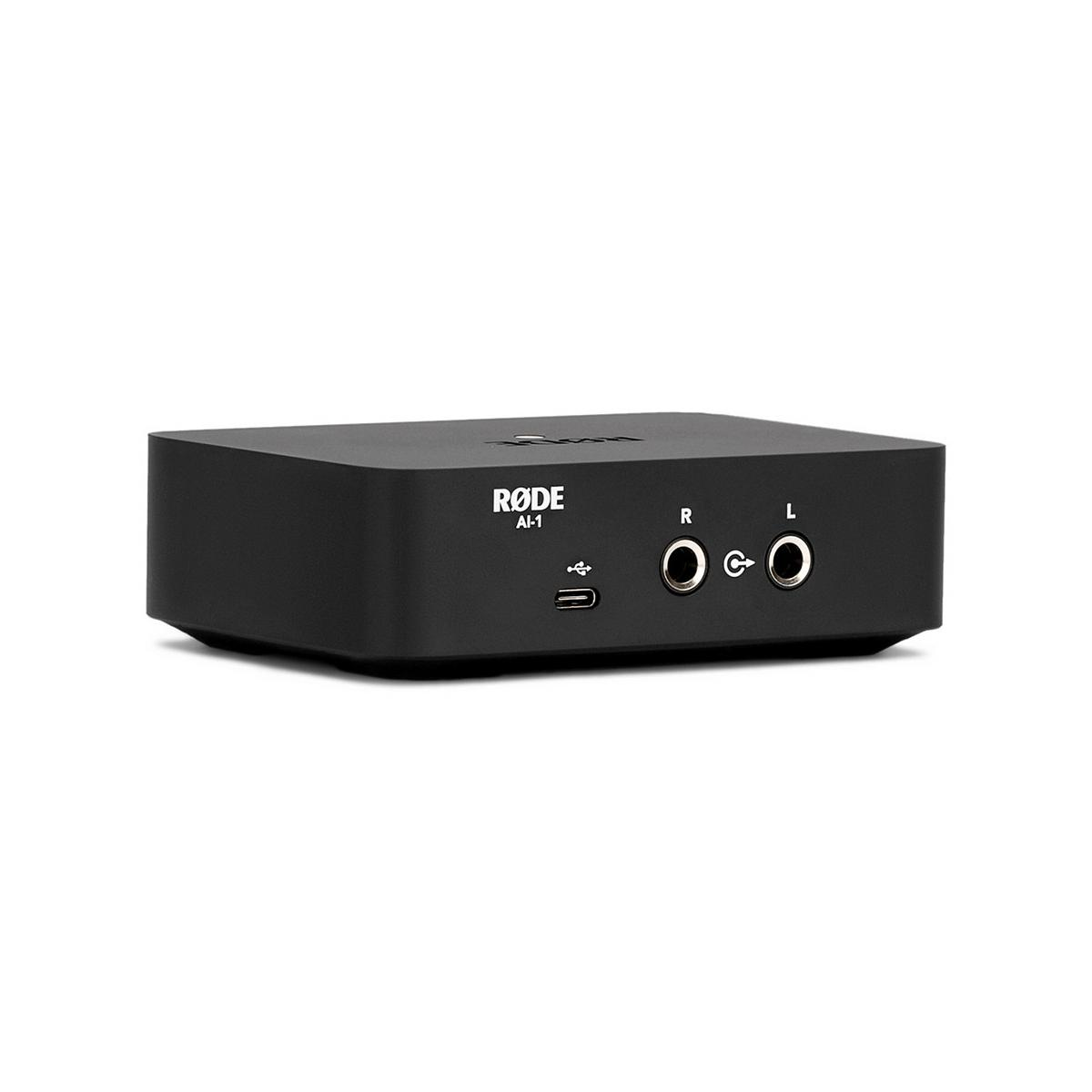 Un'interfaccia audio RODE AI-1 nera con connessioni USB e jack.