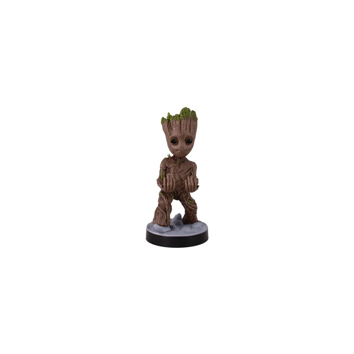 Piccola statuetta di Baby Groot su una base grigia, con fogliame verde sulla testa.