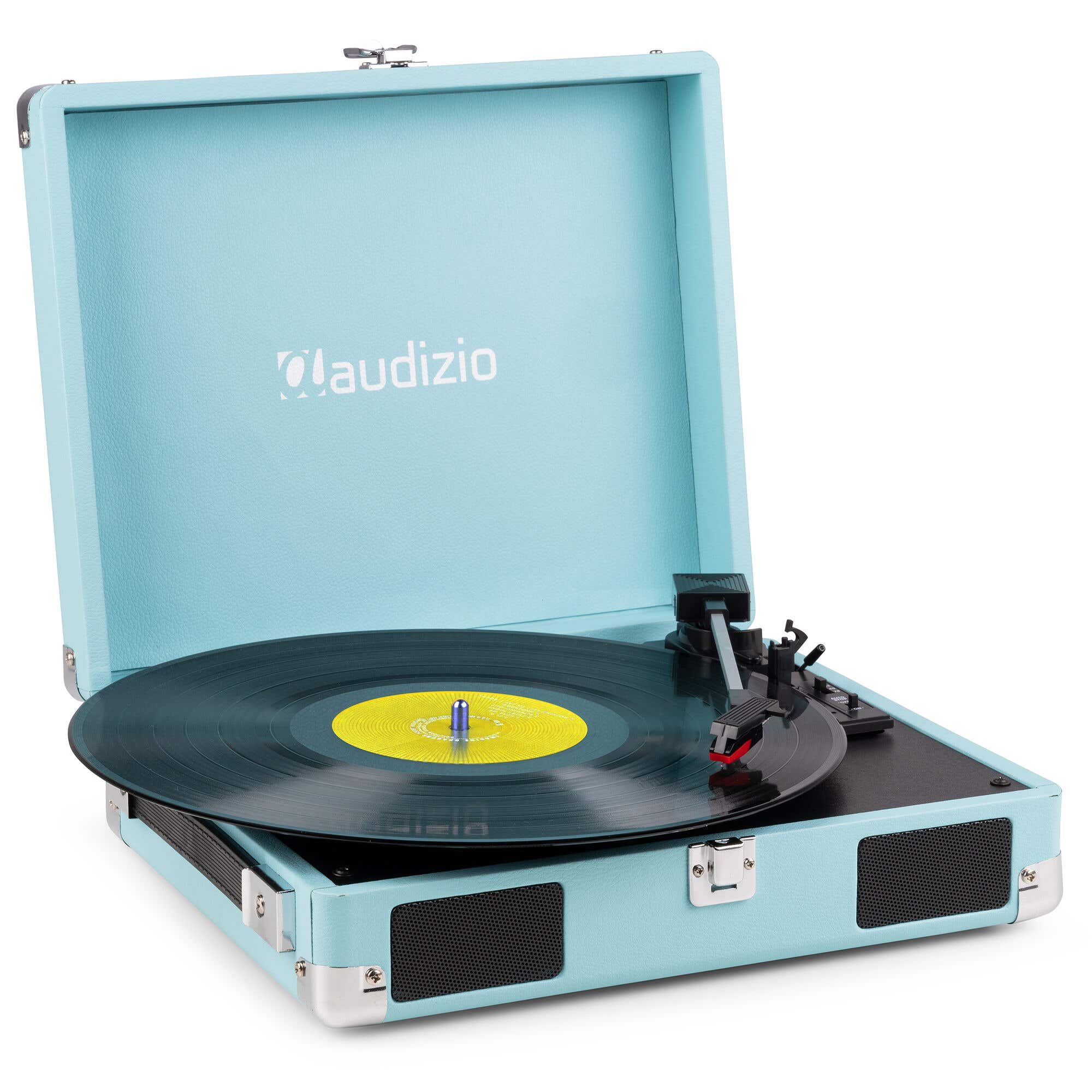 Un tocadiscos azul claro con disco de vinilo negro y etiqueta amarilla.